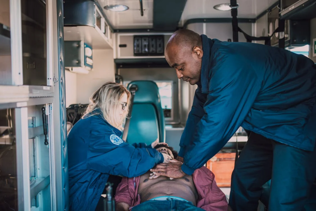 resuscitation CC0 https://www.pexels.com/photo/paramedic-performing-cpr-6520071/ 